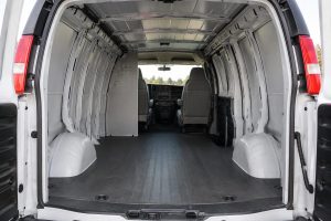 Chevrolet Express 1500 cargo van rental interior with spacious cargo area, available to rent from United Auto Rental in Orange County and Ontario, California.